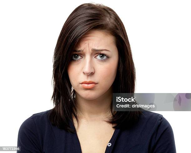 Sad Frowning Young Woman Looking At Camera Stock Photo - Download Image Now - Women, Human Face, Sulking