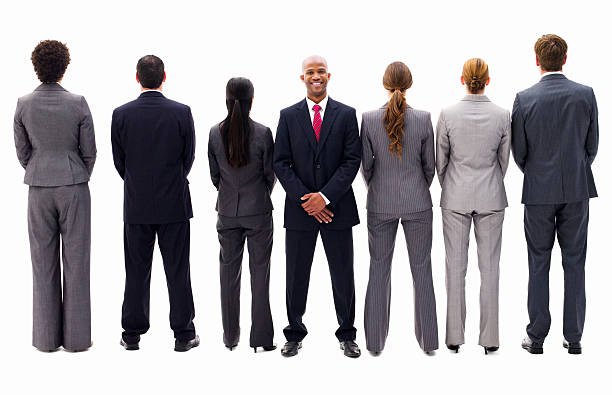 istock Businessman Facing Opposite From His Colleagues - Isolated 183772422