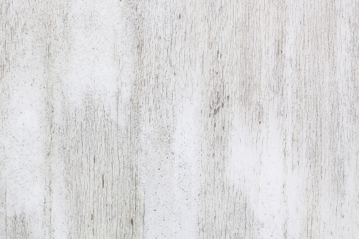 White painted weathered wood wall texture/background.