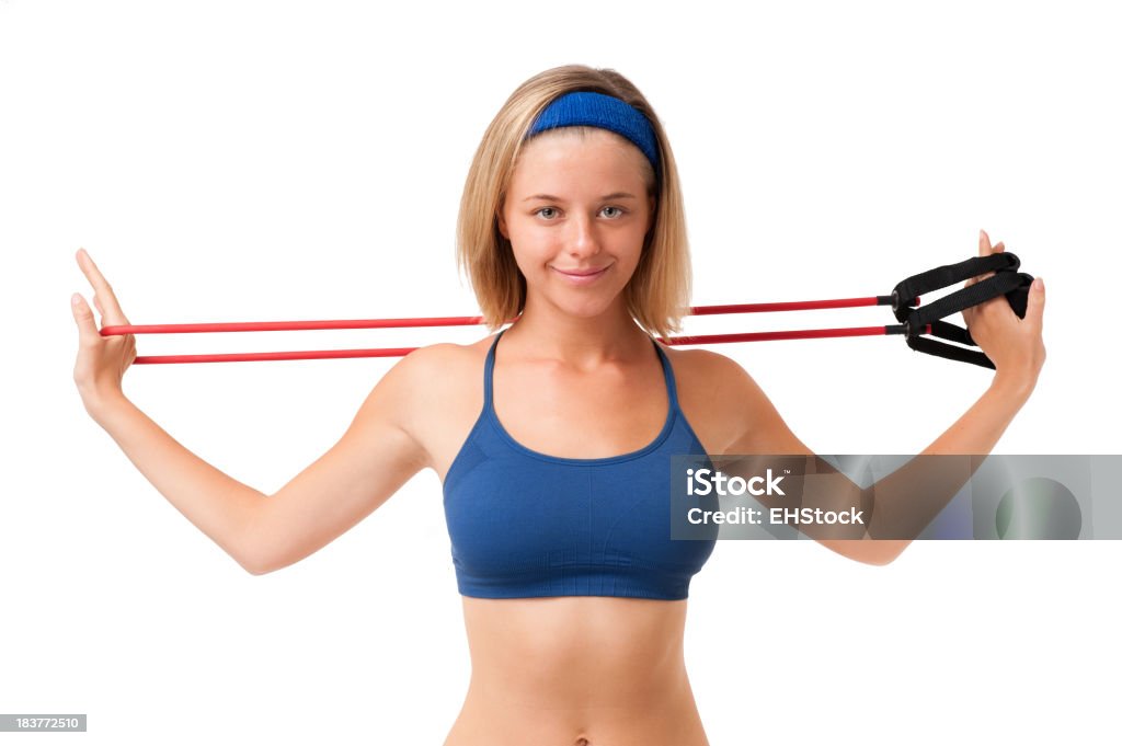 Молодая женщина фитнес-модель физические упражнения изолированные на белом фоне - Стоковые фото Молодые женщины роялти-фри
