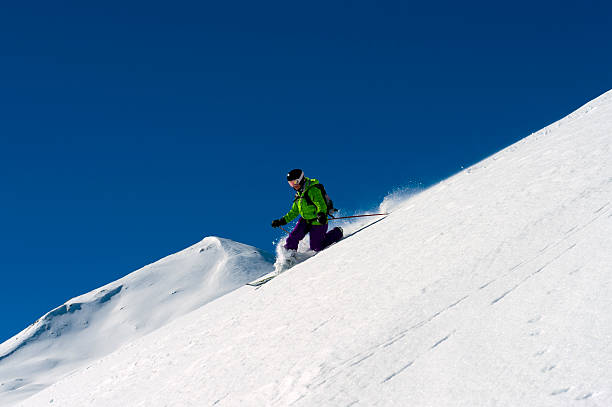 istock Woman in powder snow 183772690