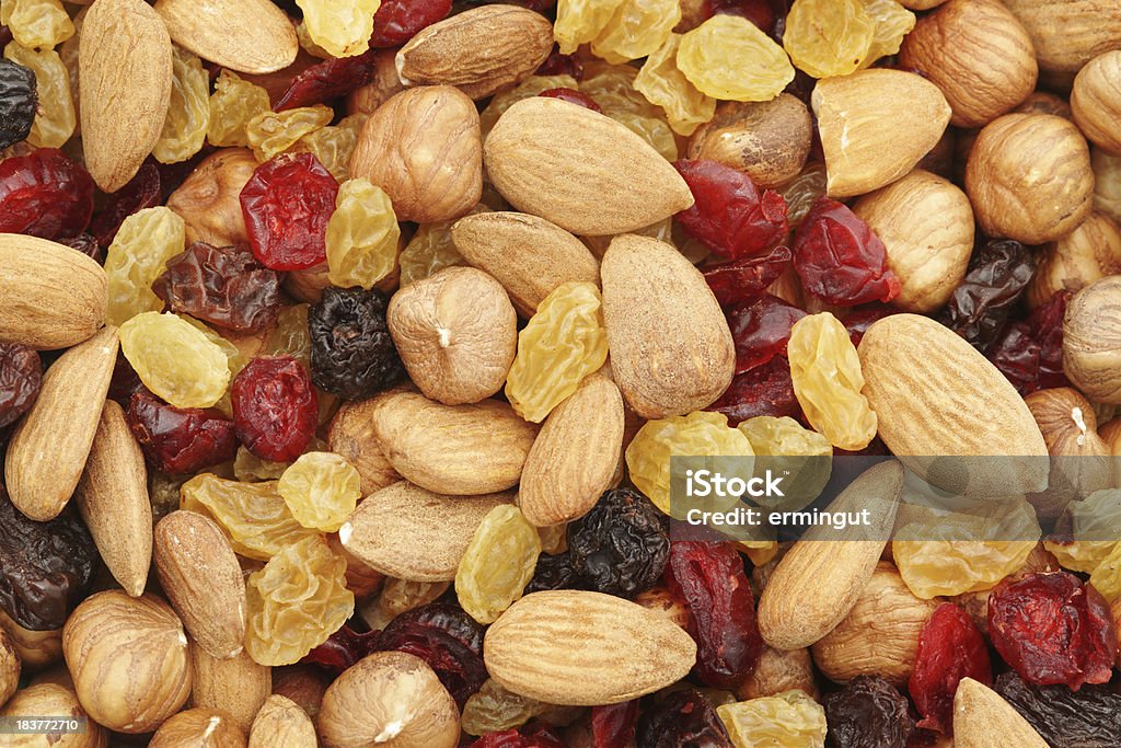 Mixed nuts and dry fruits background Mixed nuts and dry fruits background. Dried Fruit Stock Photo