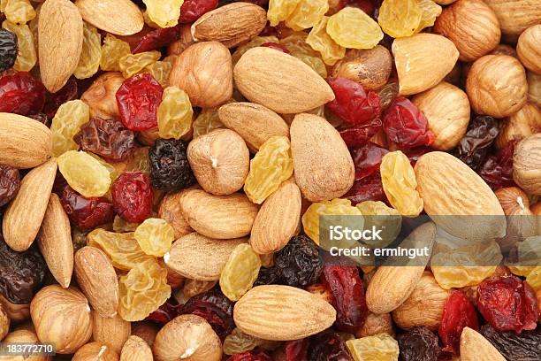 Mixed Nuts And Dry Fruits Background Stock Photo - Download Image Now - Dried Fruit, Heap, Nut - Food