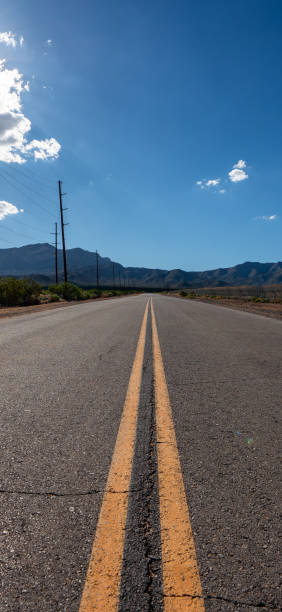 istock Empty long road on a sunny summer day at bright sunset 1837727914