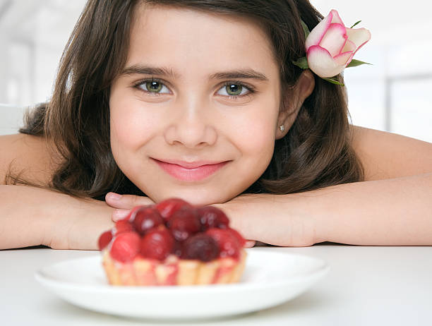 istock Cute girl with cupcake. 183773260