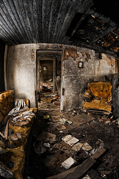 fuoco sconvolto - burnt furniture chair old foto e immagini stock