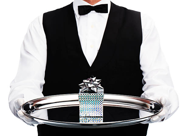 gift butler with gift on tray silver platter stock pictures, royalty-free photos & images