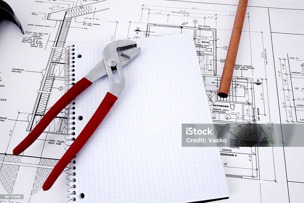 Plumbing Picture of a notepad with plumbing equipment on it. Architecture Stock Photo