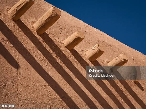 San Fracisco De Asis Mission Adobe And Posts Stock Photo - Download Image Now - Adobe - Material, Post - Structure, Wood - Material