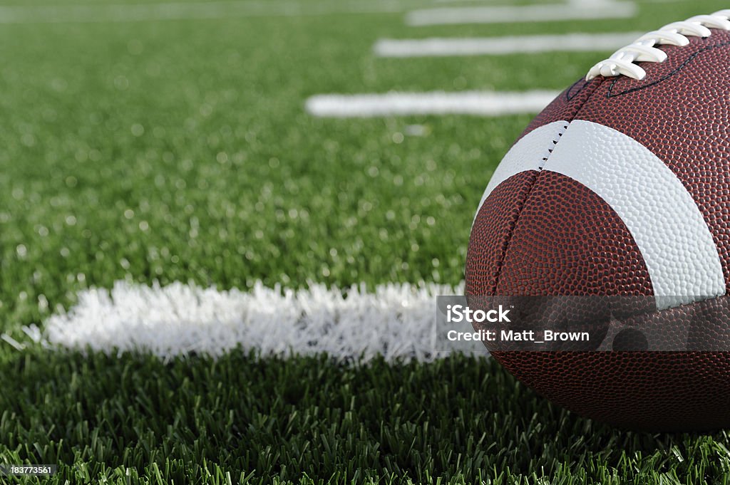 American Football Football on artificial grass American Football Field Stock Photo