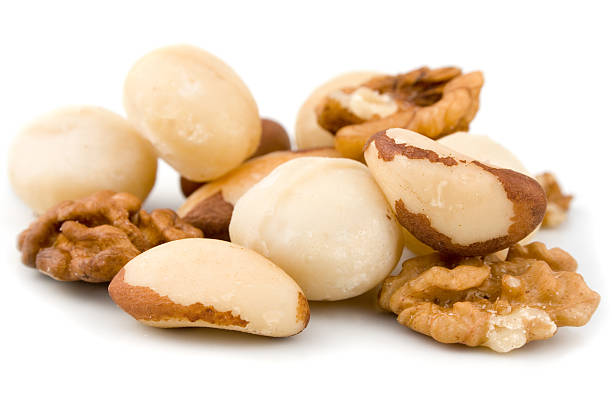 Macadamia, brazil nuts and wallnut stock photo