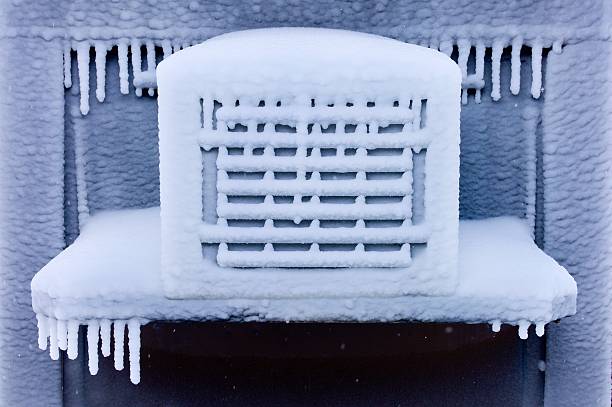 Severely Frozen Air Conditioner stock photo