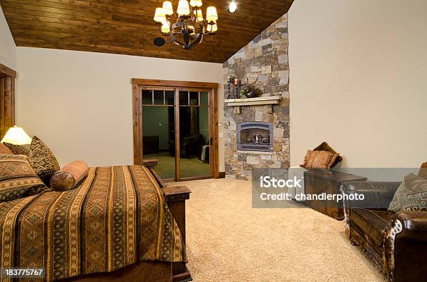 Master Bedroom With Fireplace Stock Photo - Download Image Now - Architectural Feature, Architecture, Armchair