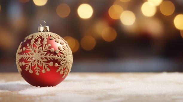 istock Red Christmas Ornament on Snow 1837759297