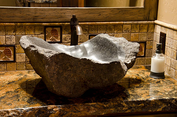 This bathroom sink is a big rock.