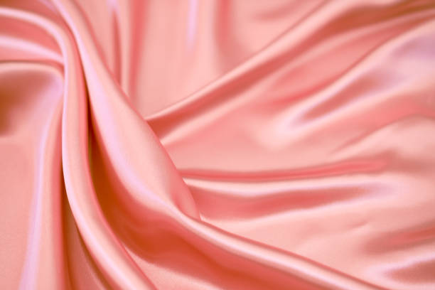 istock Stylish bright orange fabric stripes, blurred background 1837764082
