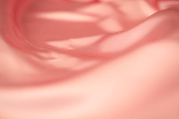 istock Stylish bright orange fabric stripes, blurred background 1837764106