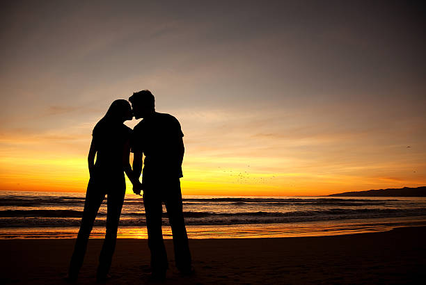 Sunset Romance Stock Photo - Download Image Now - Adult, Adults