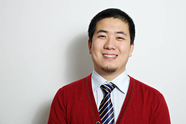 istock Businessman in red cardigan 183776544