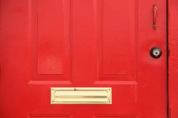 close up shot of red door.