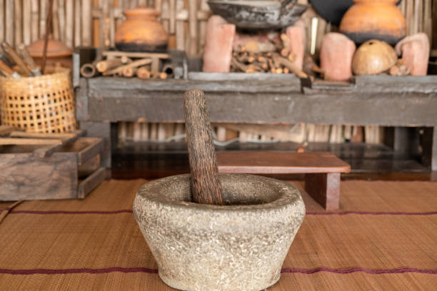 istock Stone mortar and pounding stick in a traditional Asian kitchen 1837767696