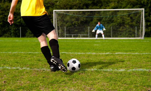 istock Soccer players tries to make a goal 183776799