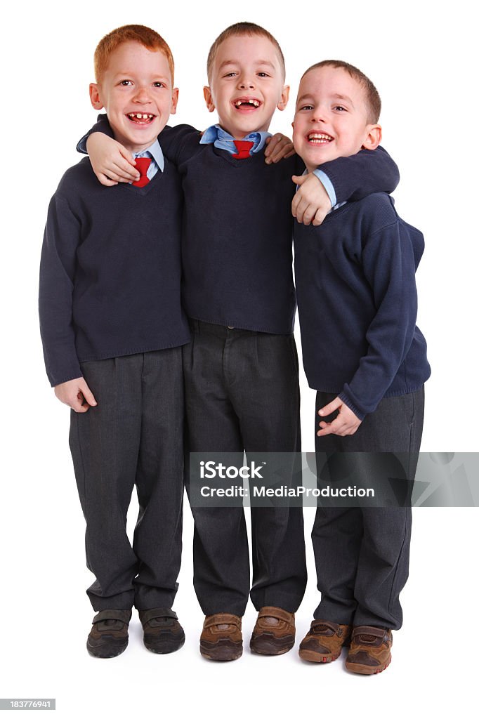 School boys in uniforms School boys in uniforms isolated on white School Uniform Stock Photo