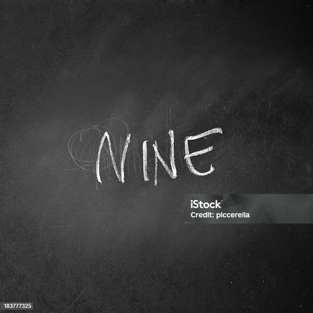 Glyph Of The Number Nine Written On A Blackboard Stock Photo - Download Image Now - Black And White, Black Color, Chalkboard - Visual Aid