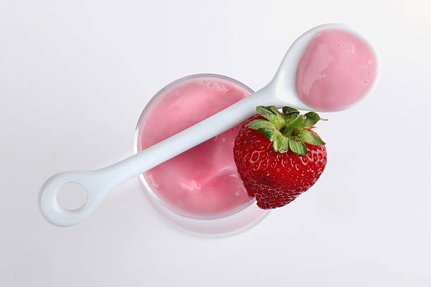 Strawberry and puding Strawberry and pudding with spoon. MORE IMAGES... healthy eating red above studio shot stock pictures, royalty-free photos & images