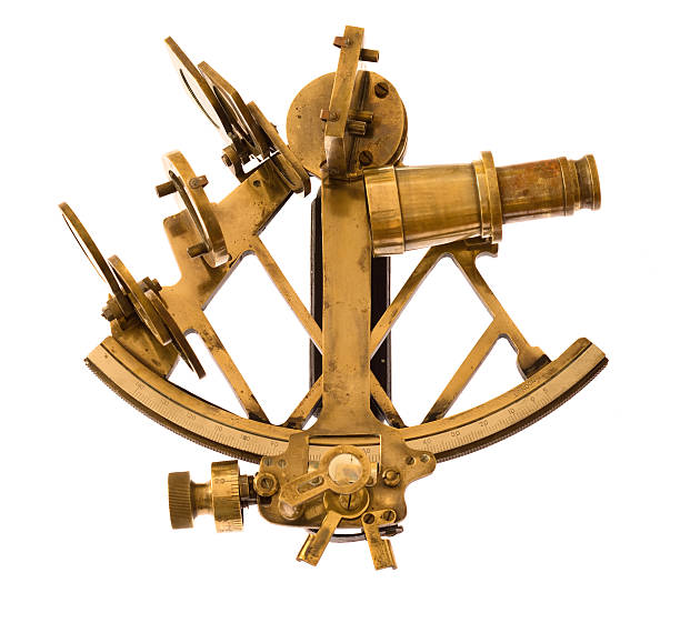 istock An old brass sextant on a white background 183777977