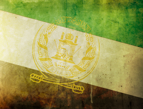 vintage and retro / the flag of afghanistan / grunge and grain added