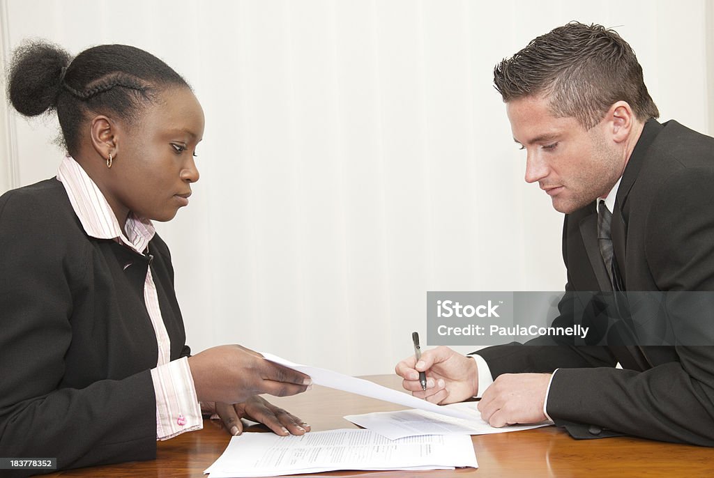 Business Meeting A man and woman at a business meeting.More images in this series: Adult Stock Photo
