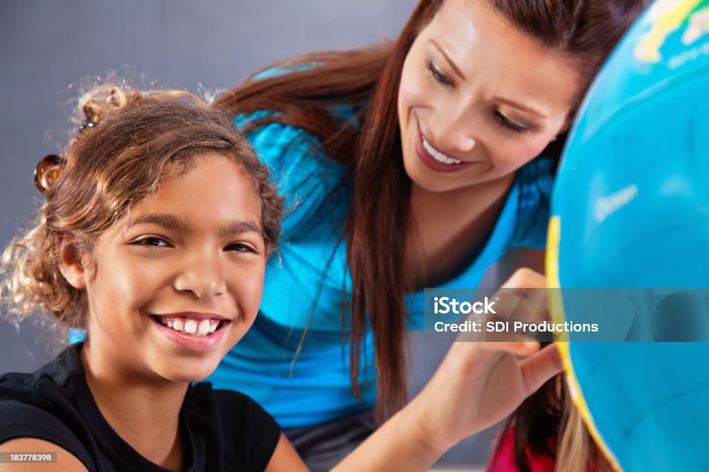 Happy Elementary Student Learning About Geography With Globe in Class Happy Elementary Student Learning About Geography With Globe in Class.See more from this series: 6-7 Years Stock Photo