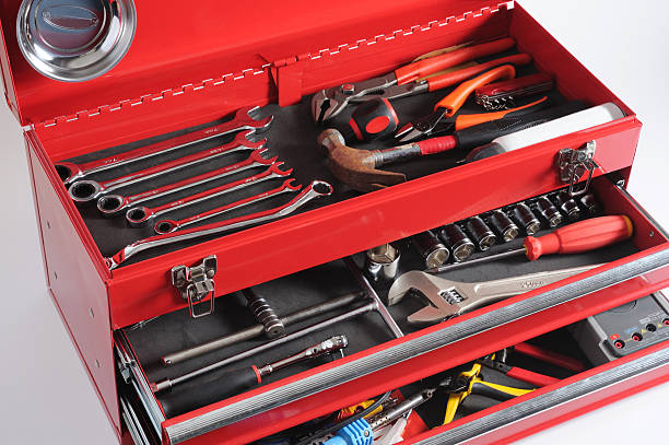 istock Red toolbox with open drawers and top full of tools  183778827