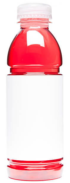 Red drink in plastic bottle with blank label stock photo