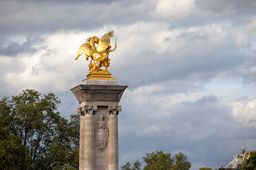 The famous statue of Admiral Nelson on Trafalgar Square in London, UK, on blue clear sky