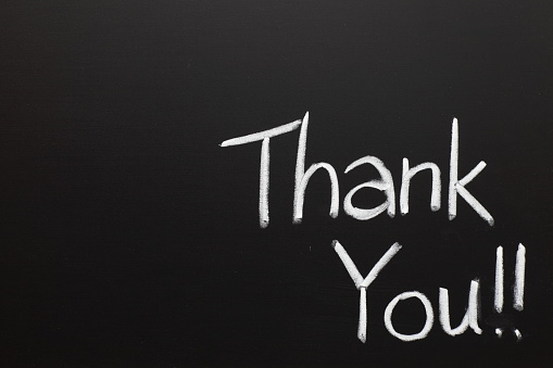 Black Board with Thank You written on it by white chalk.