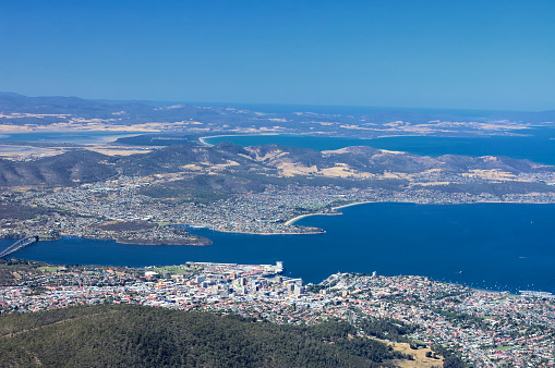 A view of Hobart, Tasmania on a clear day from Mt. Wellington. Our cruise ship can be seen near Sullivans Cove in the foreground.