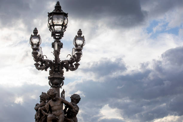 Ornate street light and sculpture on Pont Alexandre III