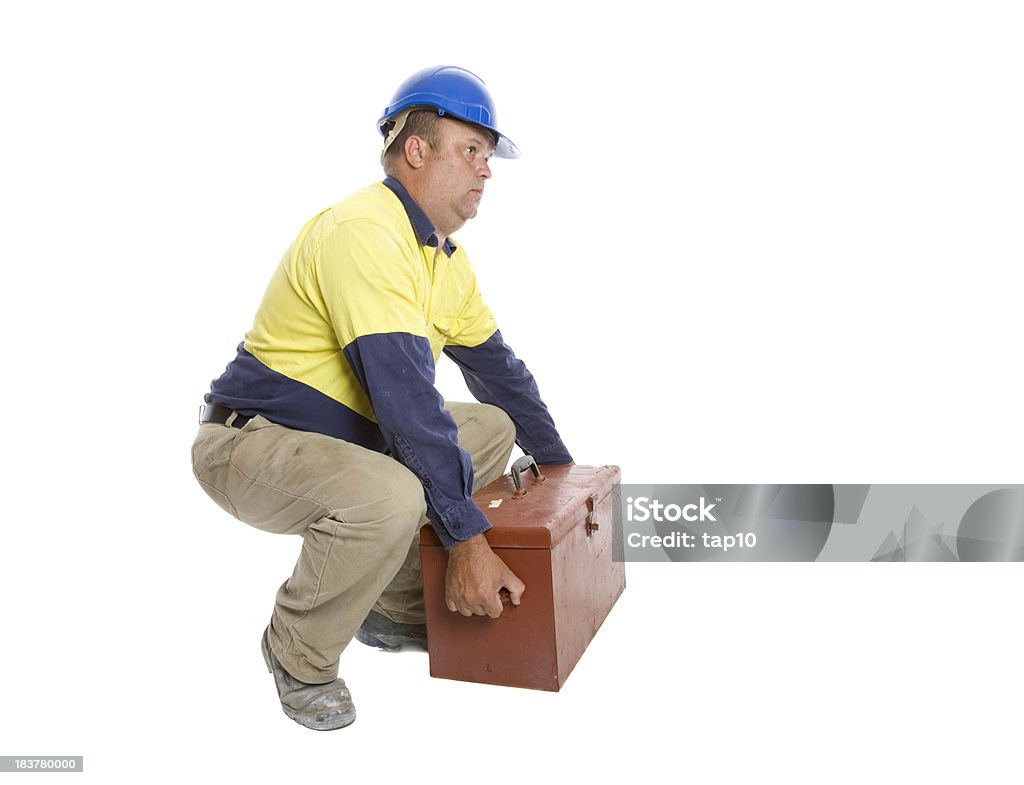 Worker Lifting A worker lifting using a straight back - safety concept. Picking Up Stock Photo