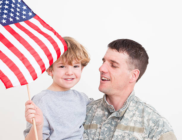 istock American soldier with his son 183780295