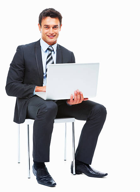istock Businessman sitting with laptop 183780428