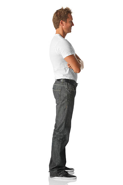 istock Profile of a man standing with arms crossed 183780552