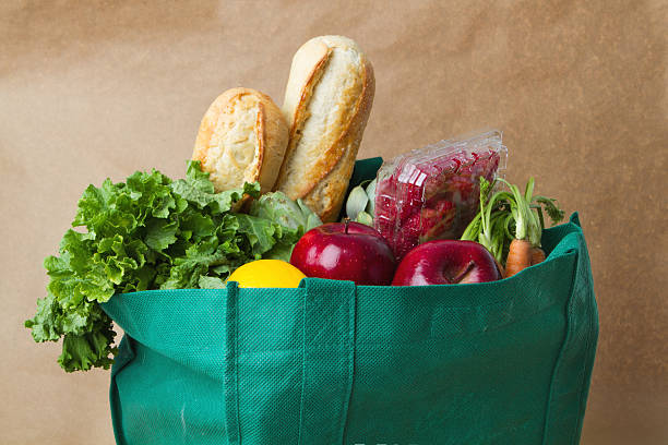 Groceries Groceries reusable bag stock pictures, royalty-free photos & images