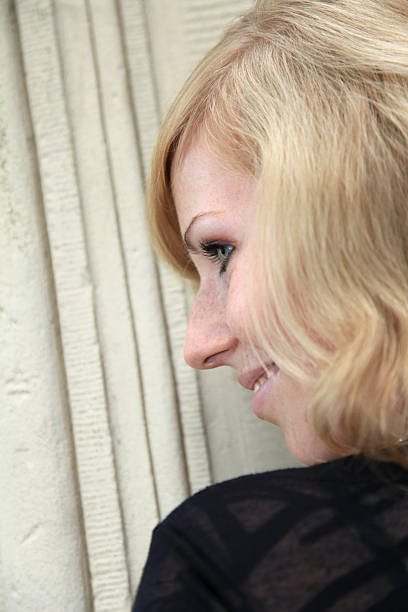istock Young caucasian woman leaning at old stone wall 183781023
