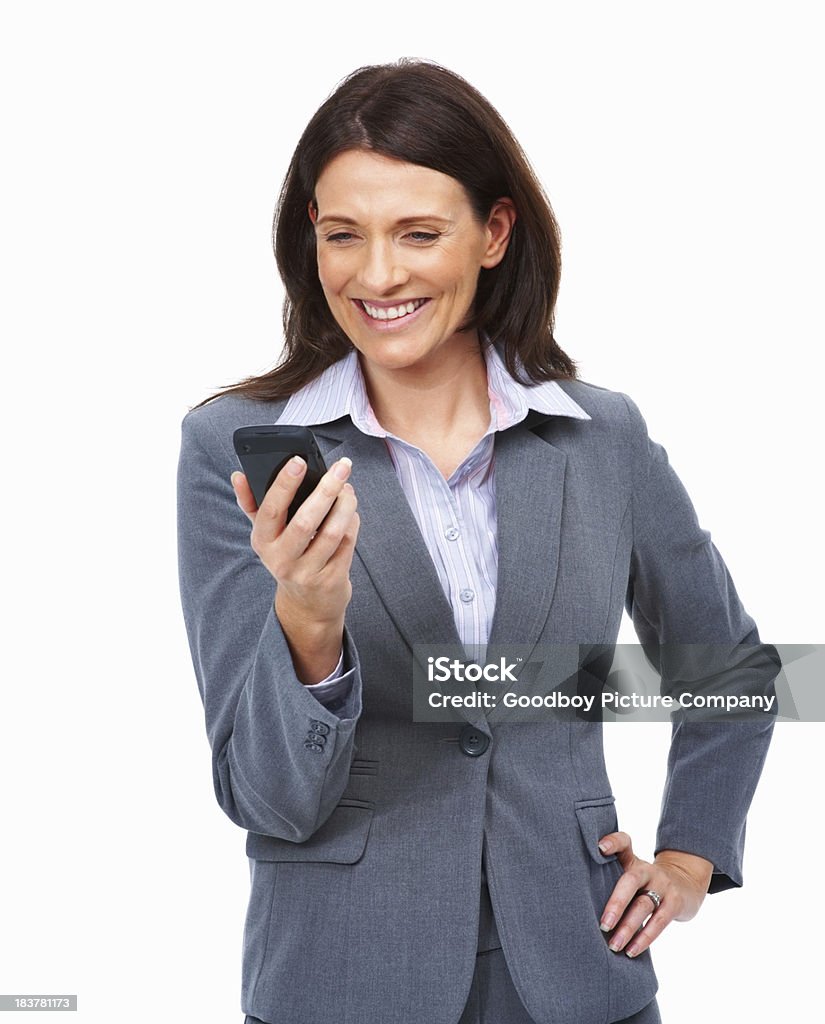 Mulher de Negócios de leitura de uma mensagem de texto - Royalty-free Adulto maduro Foto de stock