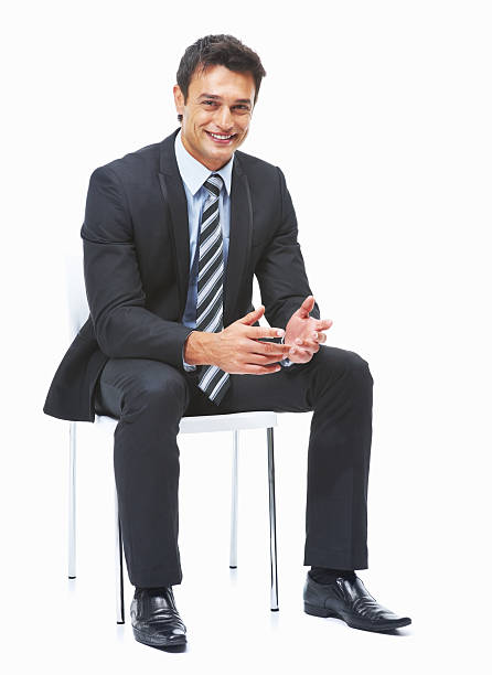 istock Business man sitting on chair smiling 183781551