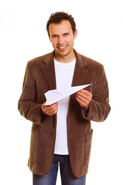 istock man with paper airplane 183781578