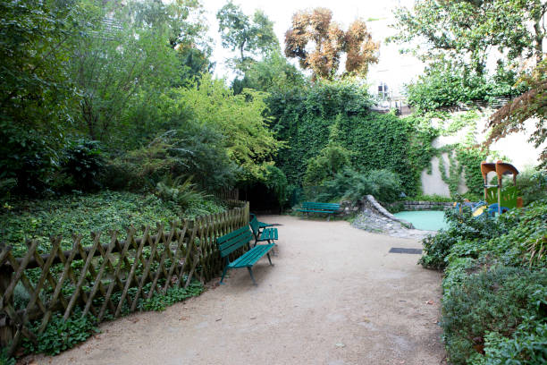 Pond with green trees in the botanical garden.