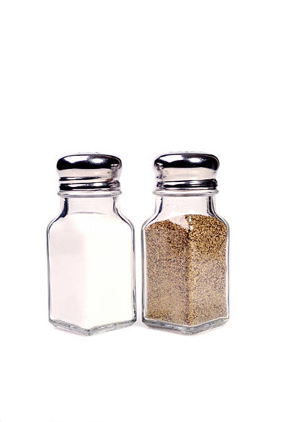 Salt and Pepper Shaker Salt and Pepper Shaker Isolated. pepper stock pictures, royalty-free photos & images